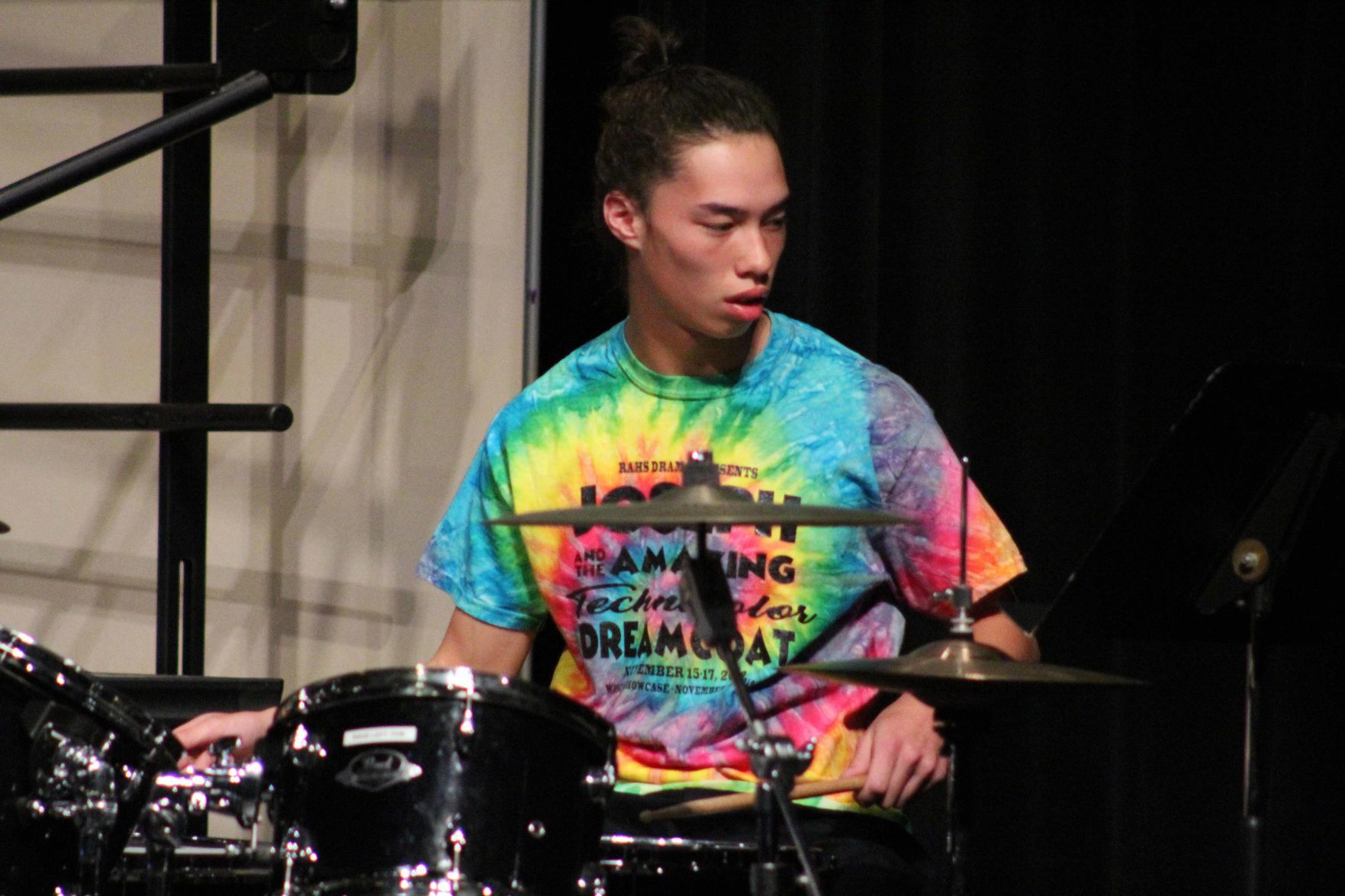 Drew plays drums
